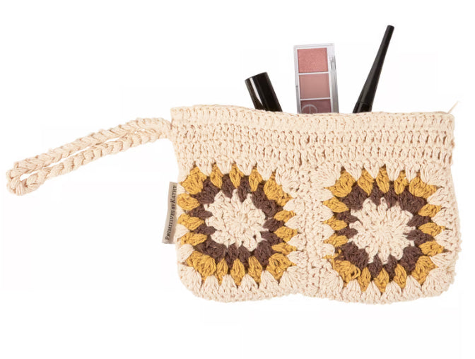 Cotton crochet sunflower wristlet clutch purse with zipper, stylish women's accessory by Primitives by Kathy, featuring a bright sunflower design.