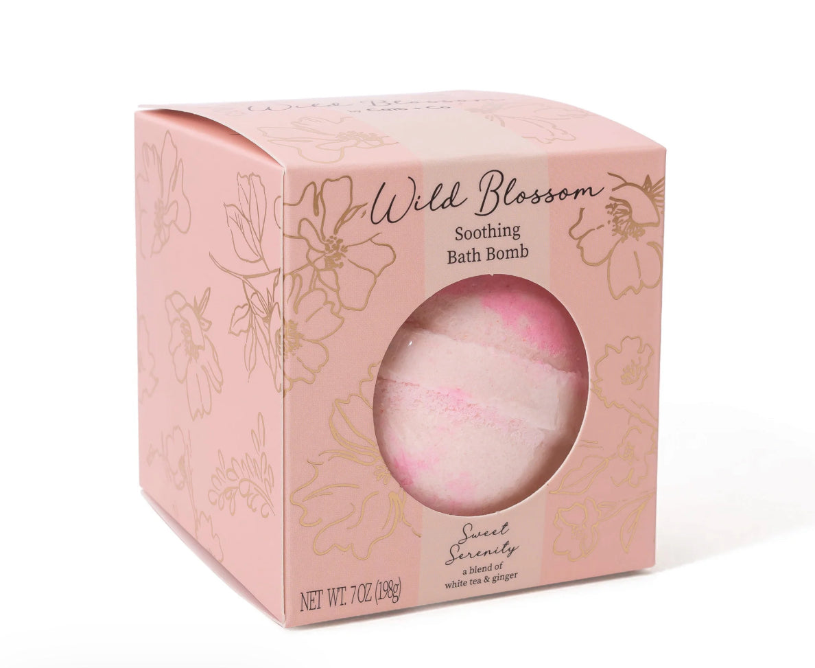 Cait and Co scented bath bombs with essential oils and coconut oil, featuring colorful, round bath bombs in a relaxing spa setting.