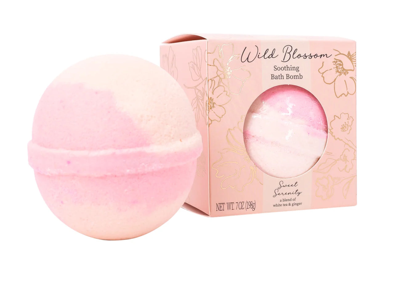 Cait and Co scented bath bombs with essential oils and coconut oil, showcasing colorful round bath bombs in a relaxing setting