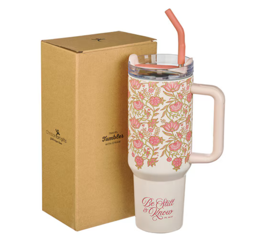 Pink floral Be Still & Know stainless steel 40 oz insulated tumbler with Christian Art Gifts branding, designed for hot and cold drinks.
