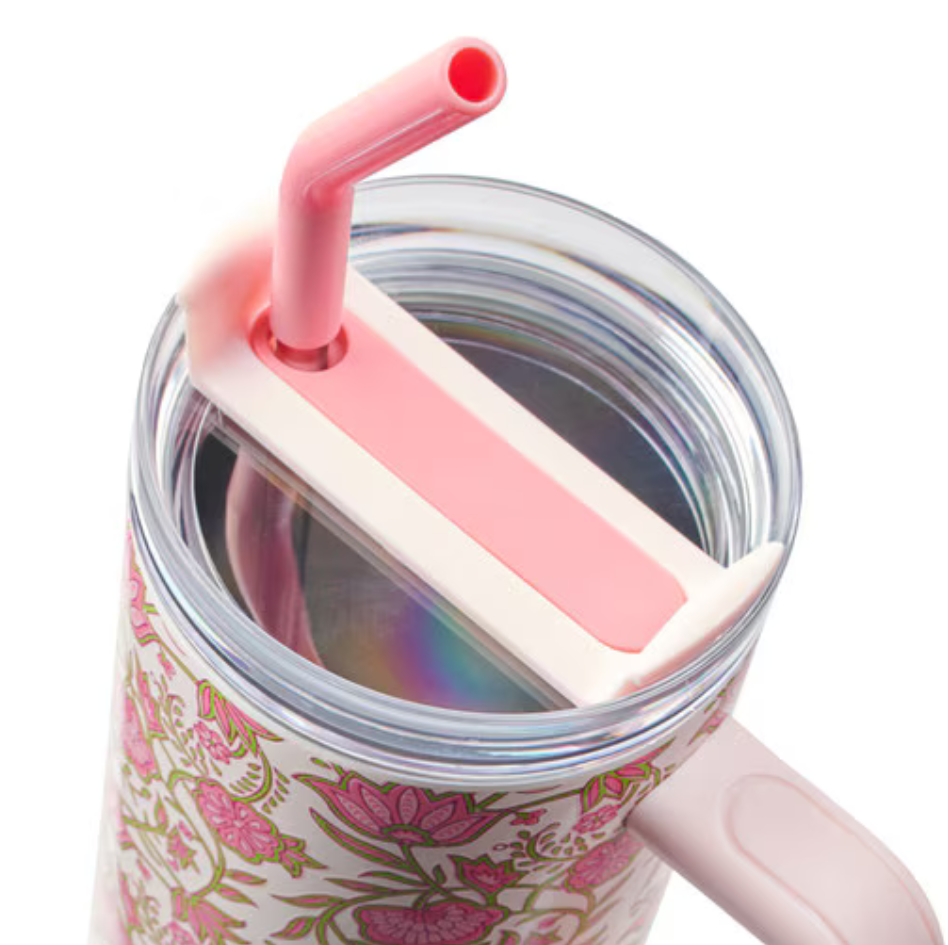 Pink floral Be Still & Know stainless steel 40 oz insulated travel mug by Christian Art Gifts, with a floral design and leak-proof lid.