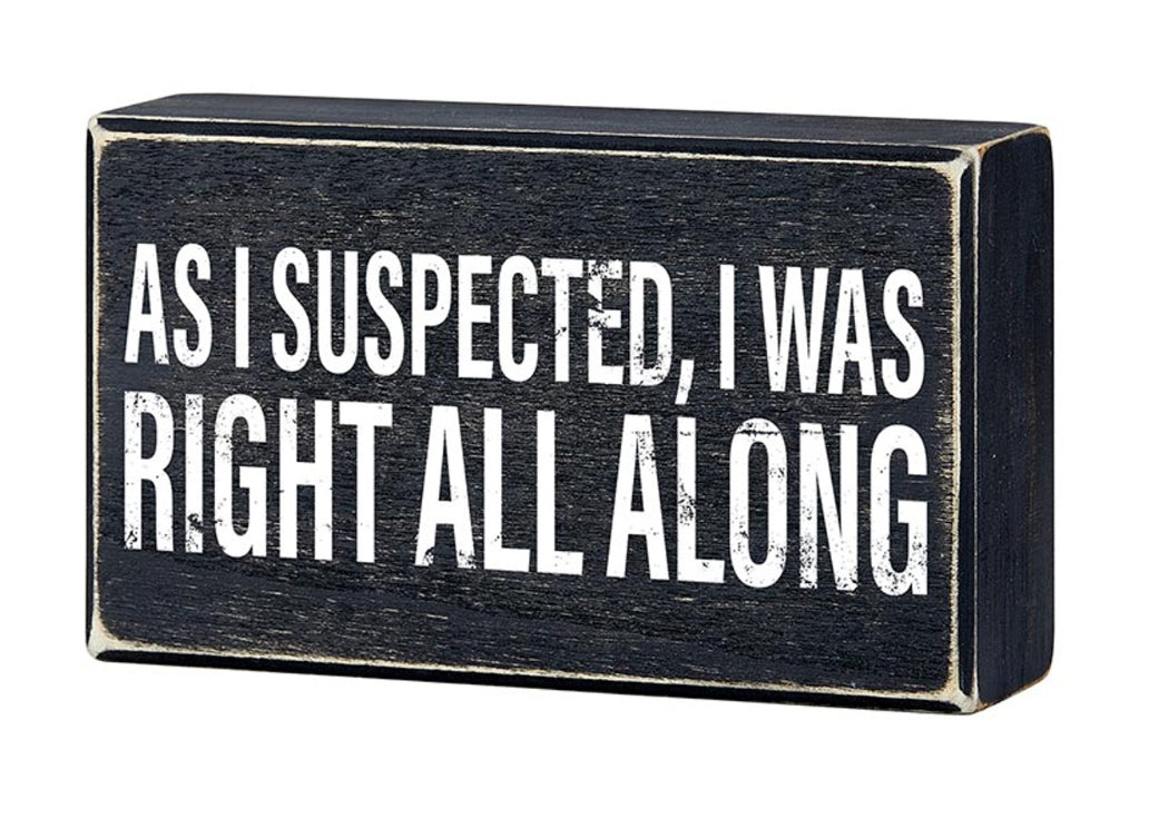 Funny wood block sign by Faithworks with the phrase "As I Suspected, I Was Right All Along" used as home decor.
