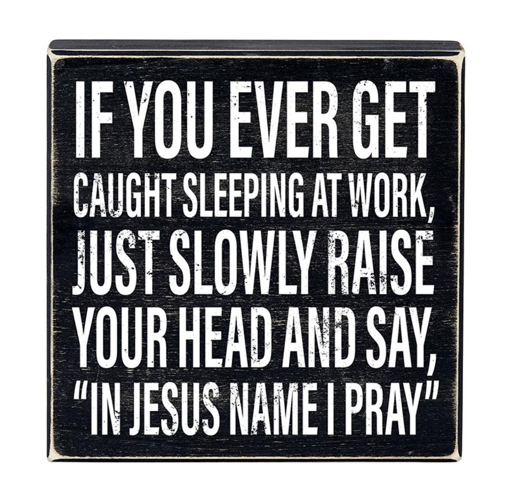 Funny sleeping at work wood sign by Faithworks featuring a humorous message about praying in Jesus' name, perfect for office decor.