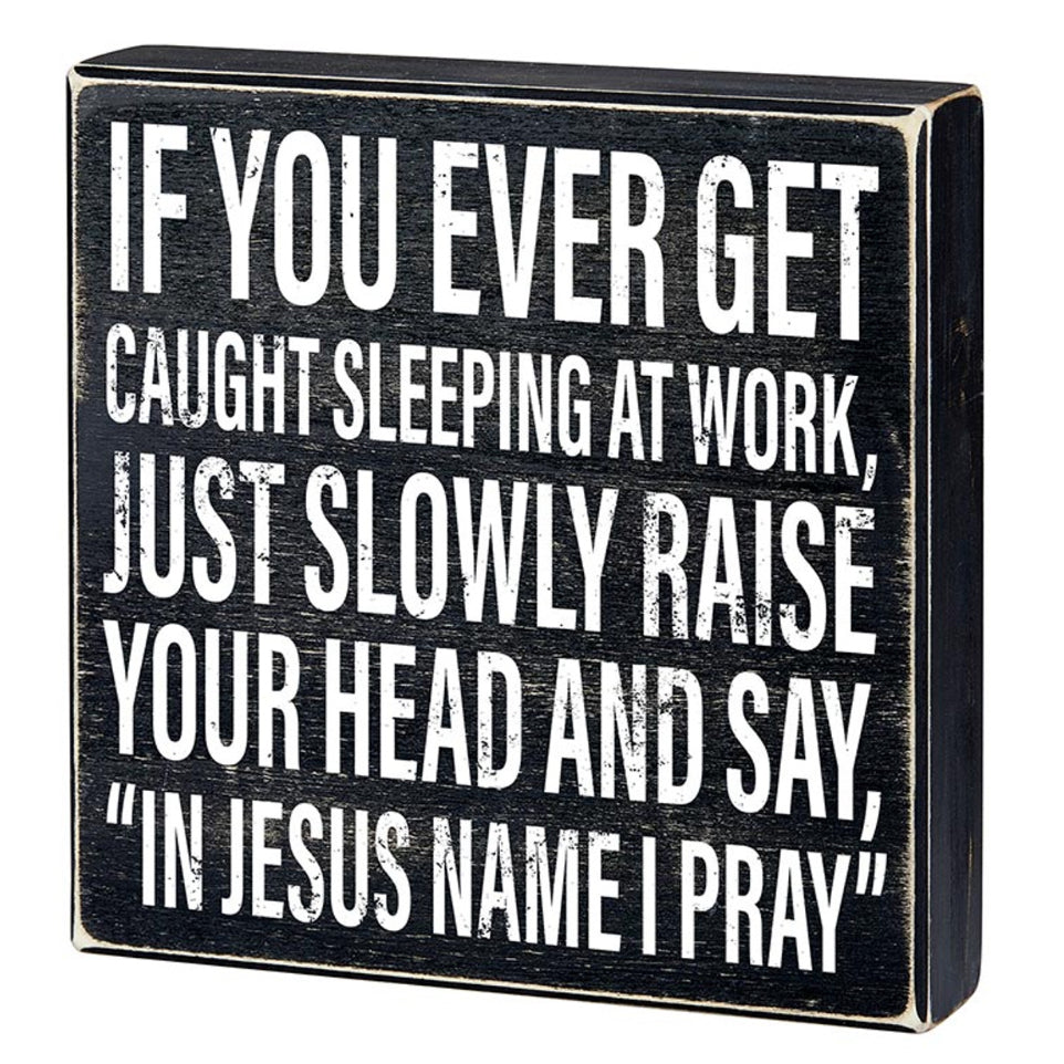 Funny sleeping at work wood sign by Faithworks with the phrase "In Jesus Name I Pray" for humorous home or office decor.