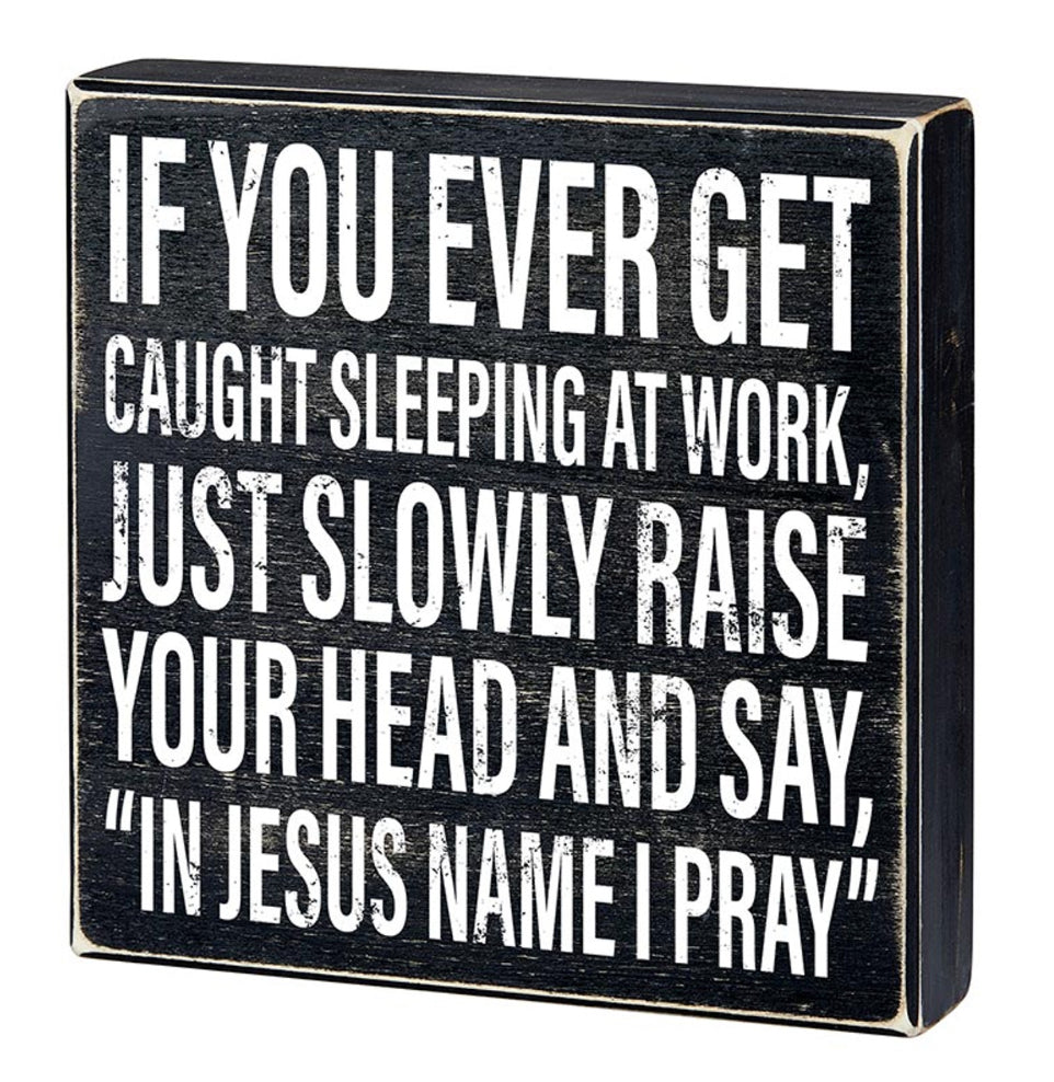 Funny sleeping at work wood sign by Faithworks with the phrase "In Jesus Name I Pray" for humorous home or office decor.