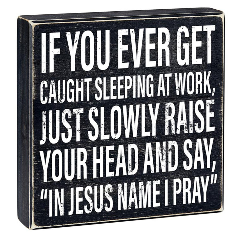 Funny sleeping at work wood sign by Faithworks with humorous "In Jesus Name I Pray" message, perfect for workplace decor.