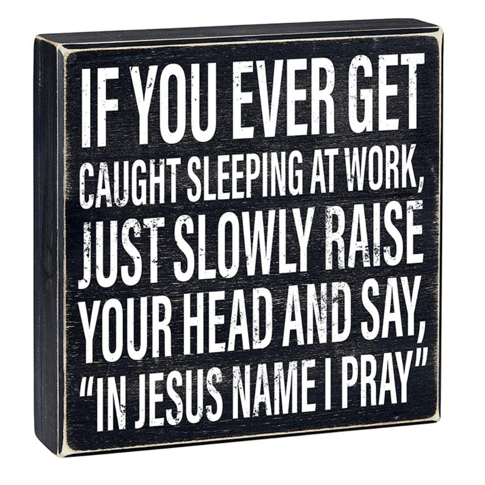 Funny sleeping at work wood sign by Faithworks with humorous "In Jesus Name I Pray" message, perfect for workplace decor.