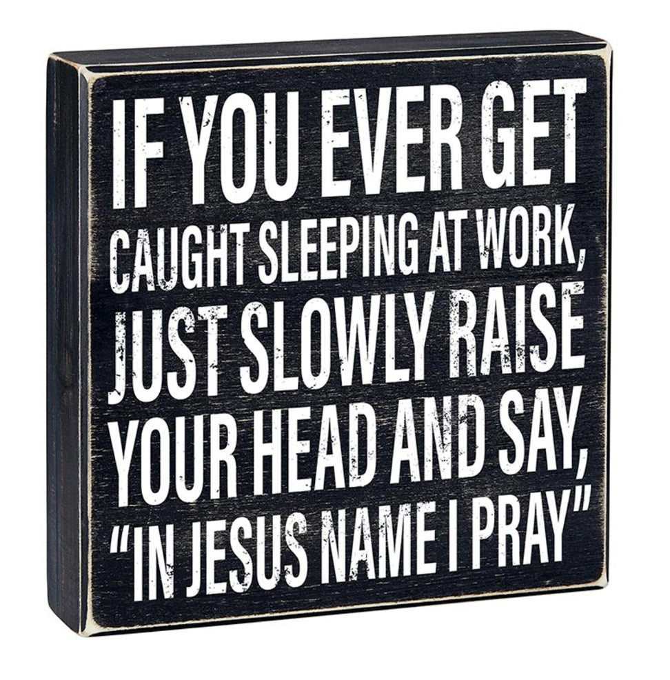 Funny sleeping at work wood sign by Faithworks with humorous "In Jesus Name I Pray" message, perfect for workplace decor.