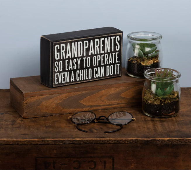 Primitives by Kathy wooden decor sign reading "Grandparents - So Easy to Operate" with rustic finish and black lettering.