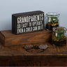 Primitives by Kathy wooden decor sign reading "Grandparents - So Easy to Operate" with rustic finish and black lettering.